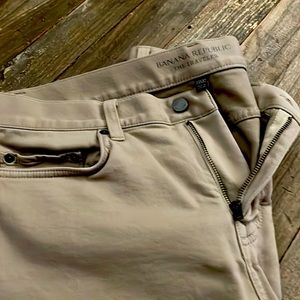 Five pocket slim fit khaki jean, 33” waist, 32”inseam.